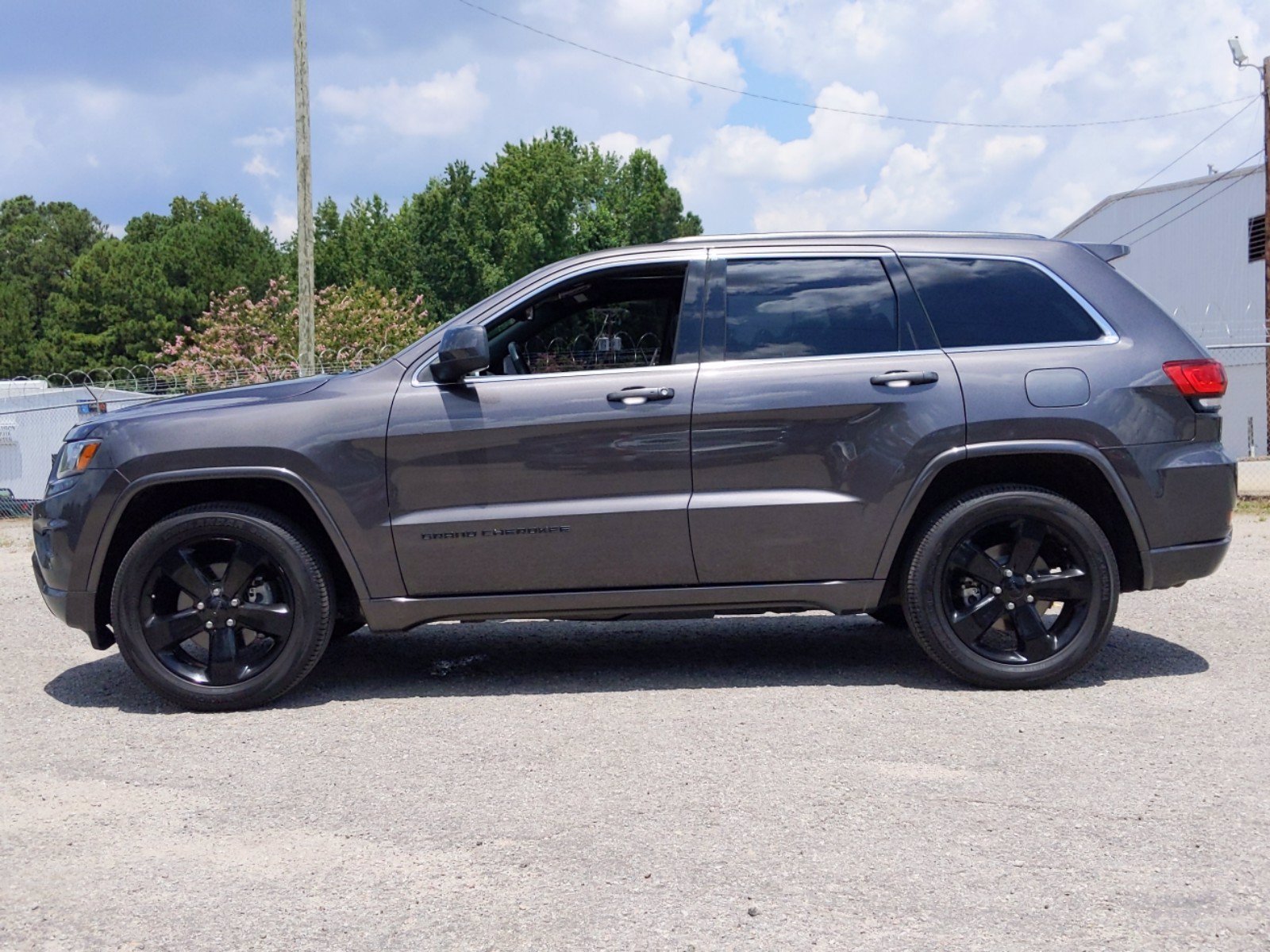 PreOwned 2015 Jeep Grand Cherokee Altitude RWD Sport Utility