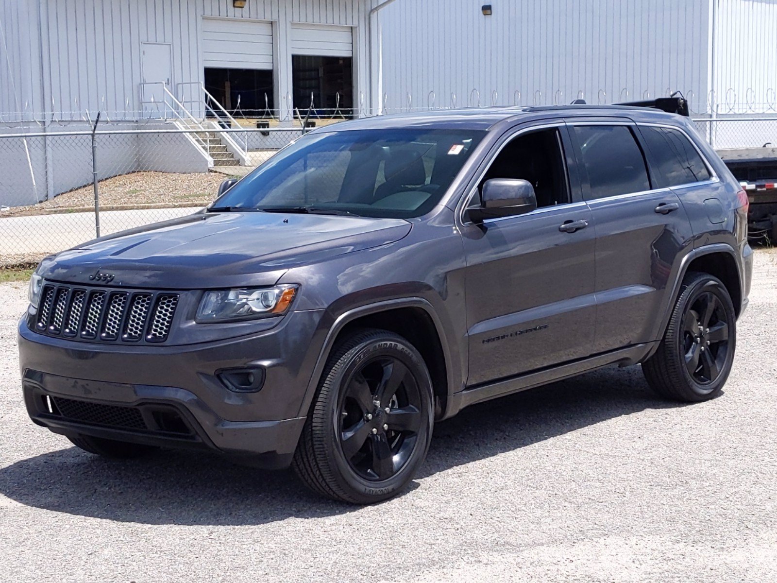 PreOwned 2015 Jeep Grand Cherokee Altitude RWD Sport Utility